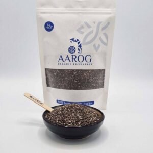 Aarog Organic Chia Seeds premium white stand-up pouch with wooden spoon and bowl of fresh seeds