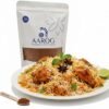 Aarog Grand Authentic Biryani Masala recipe mix pouch with vibrant Biryani on a plate.