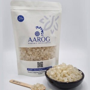 Premium organic acacia gum crystals in a ceramic bowl with white pouch packaging
